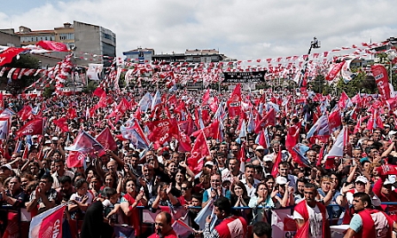 Supporters of the Republican People's Party (CHP) wave party flags during an election campaign rally in Istanbul, Turkey